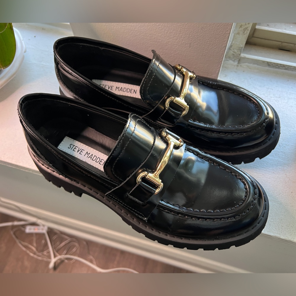 Steve Madden Glossy Black Loafers with Gold Accent